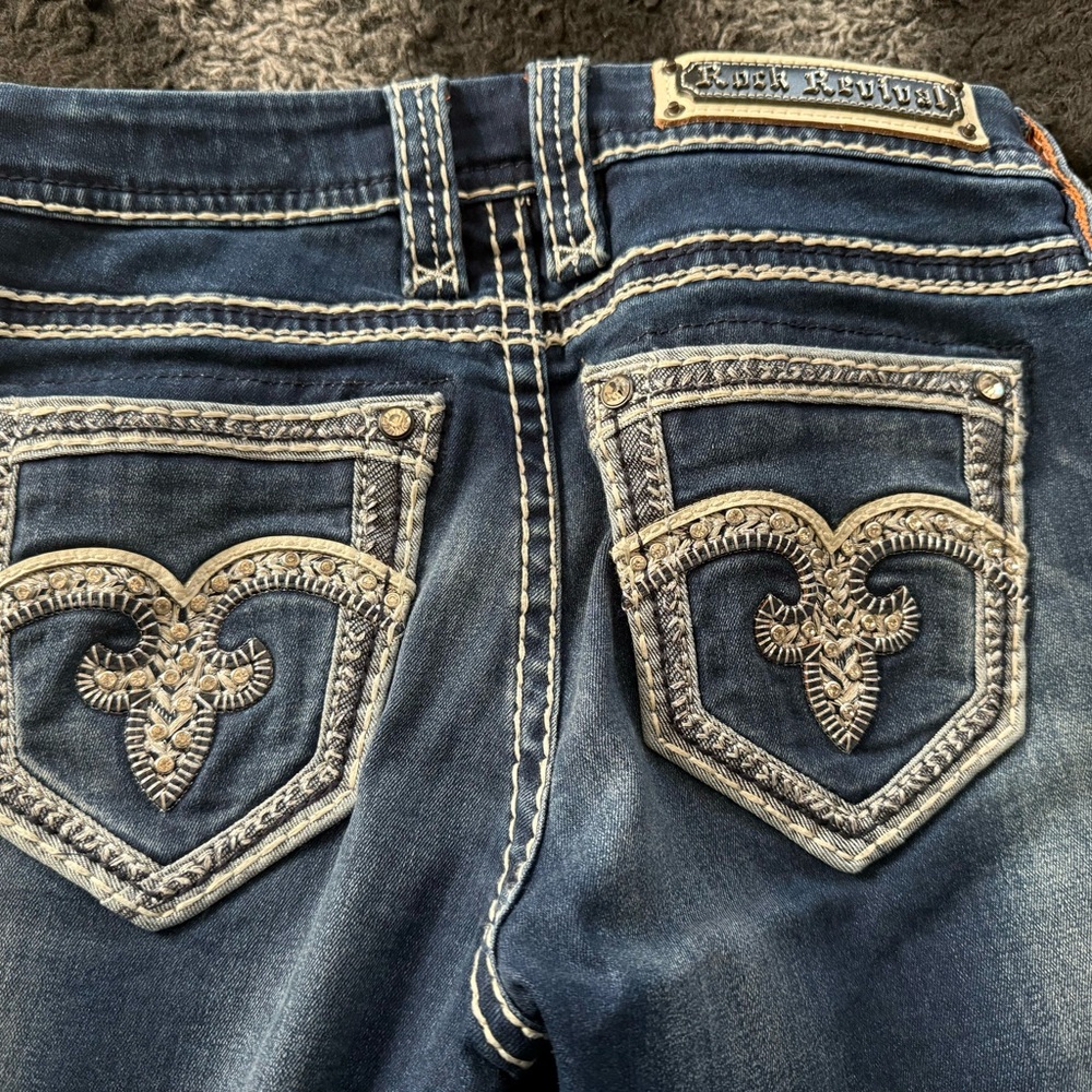 Two pairs of almost like new Rock Revival skinny jeans size 27 inseam 31.